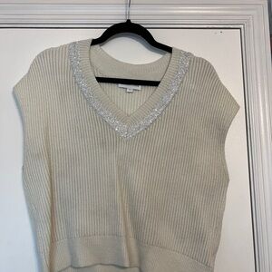 Elegant Cream V-Neck Sweater with Silver Accents